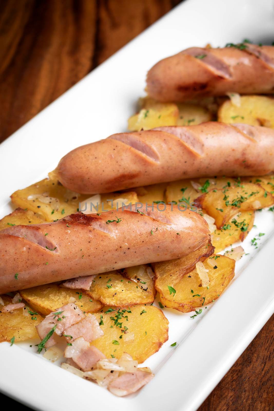 german cheese sausages with fried potato and mustard by jackmalipan