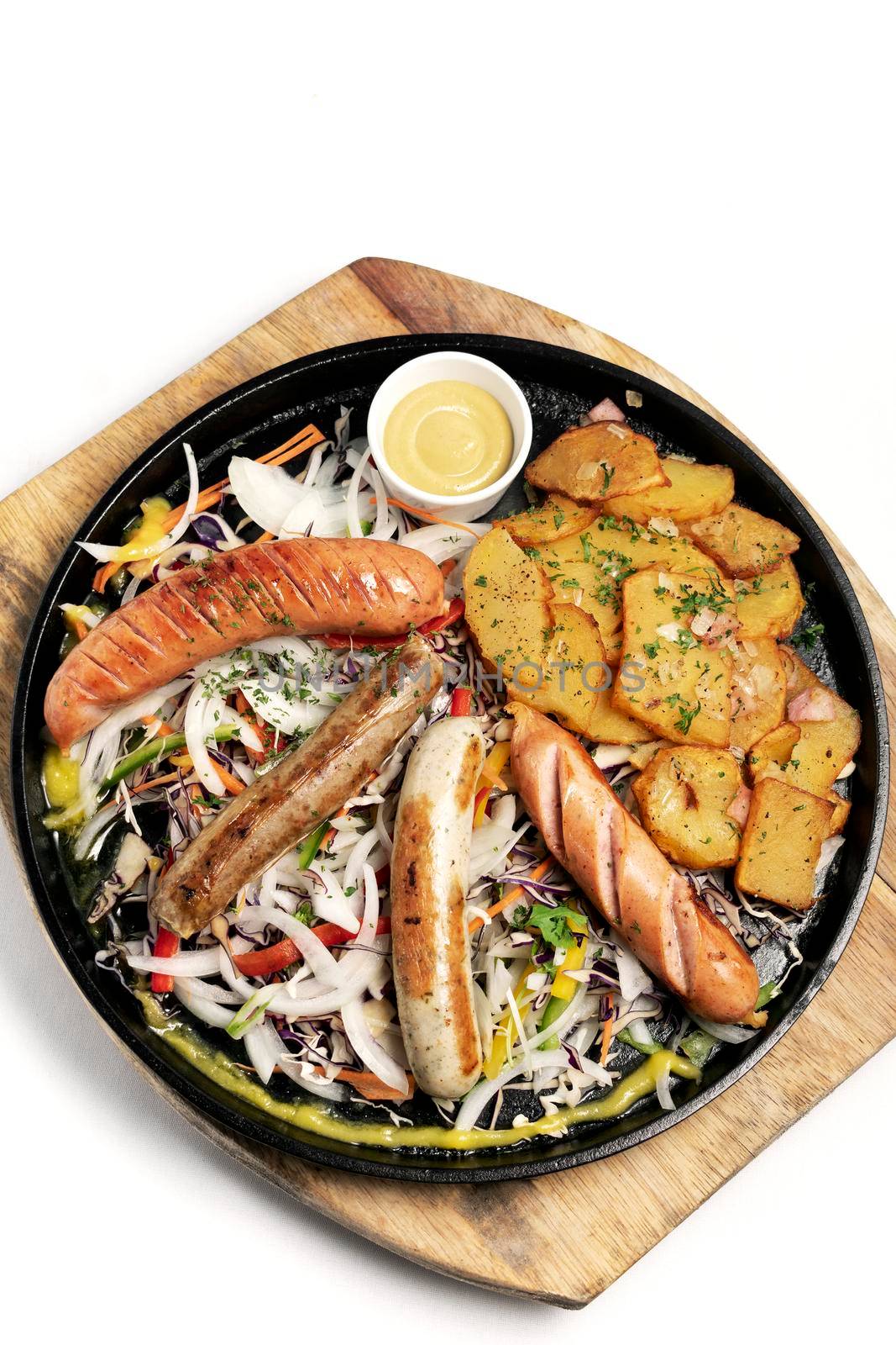 mixed german traditional organic sausage and potato meal platter by jackmalipan