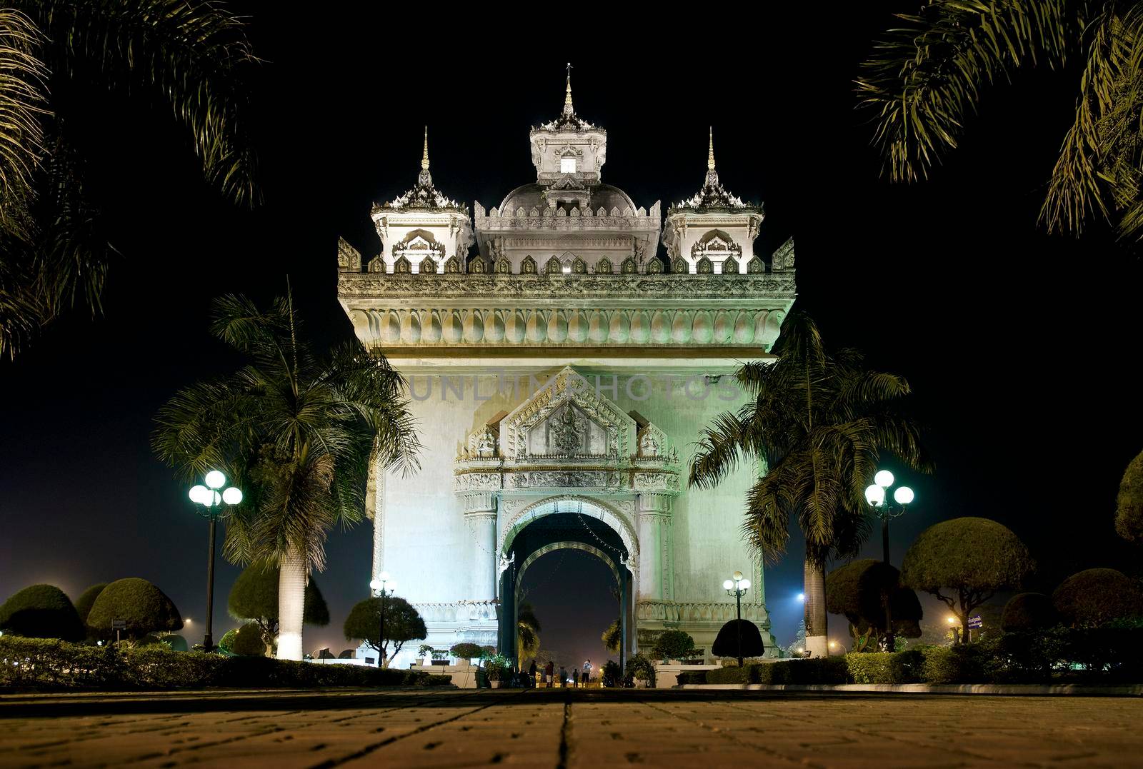 patuxai arch landmark in vientiane city laos at night 
 by jackmalipan