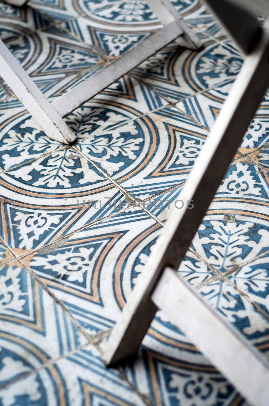 traditional design old rustic floor tiles detail in seville andalucia cafe