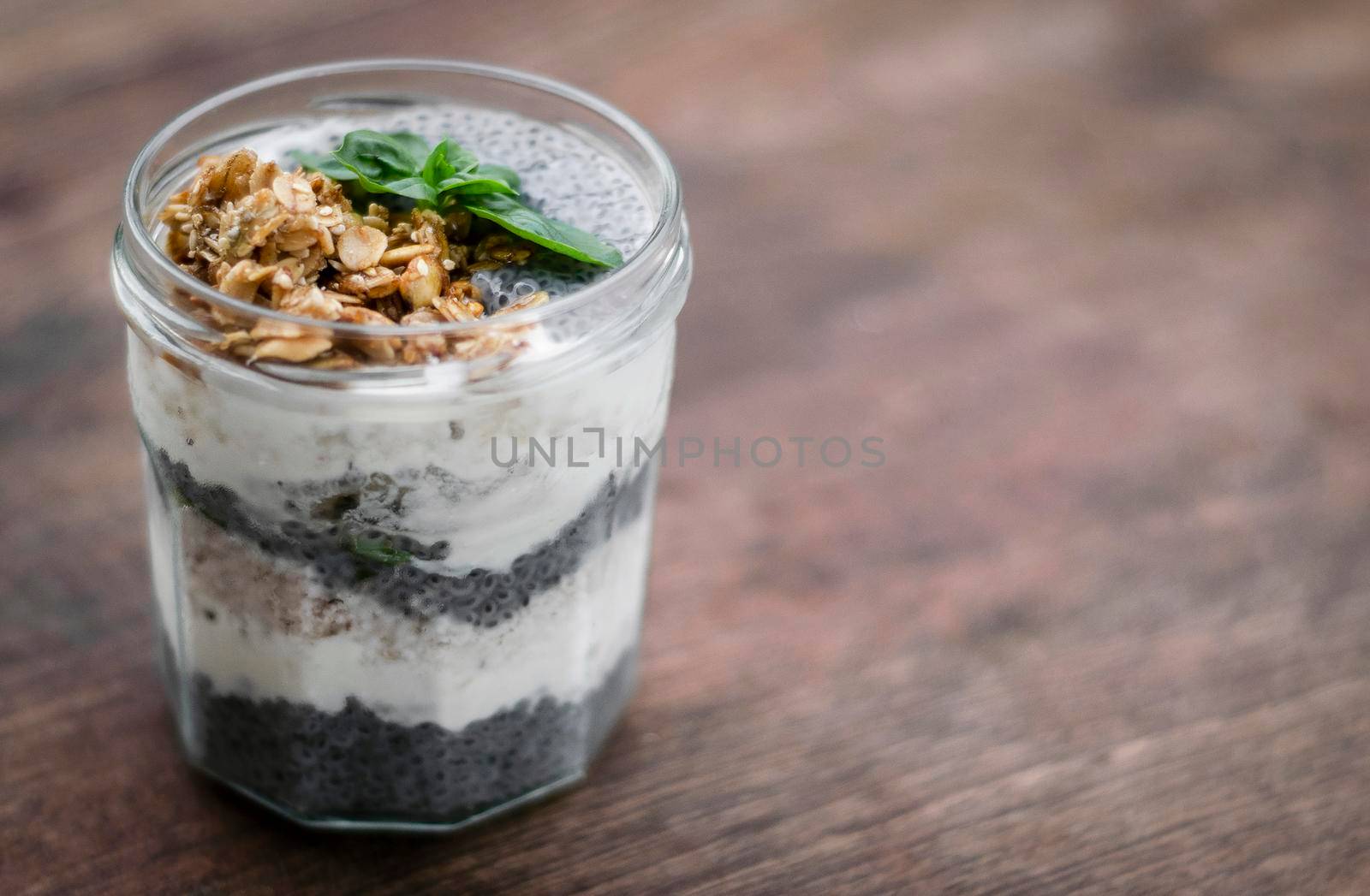 homemade healthy rustic yoghurt and granola with basil seeds breakfast snack cup