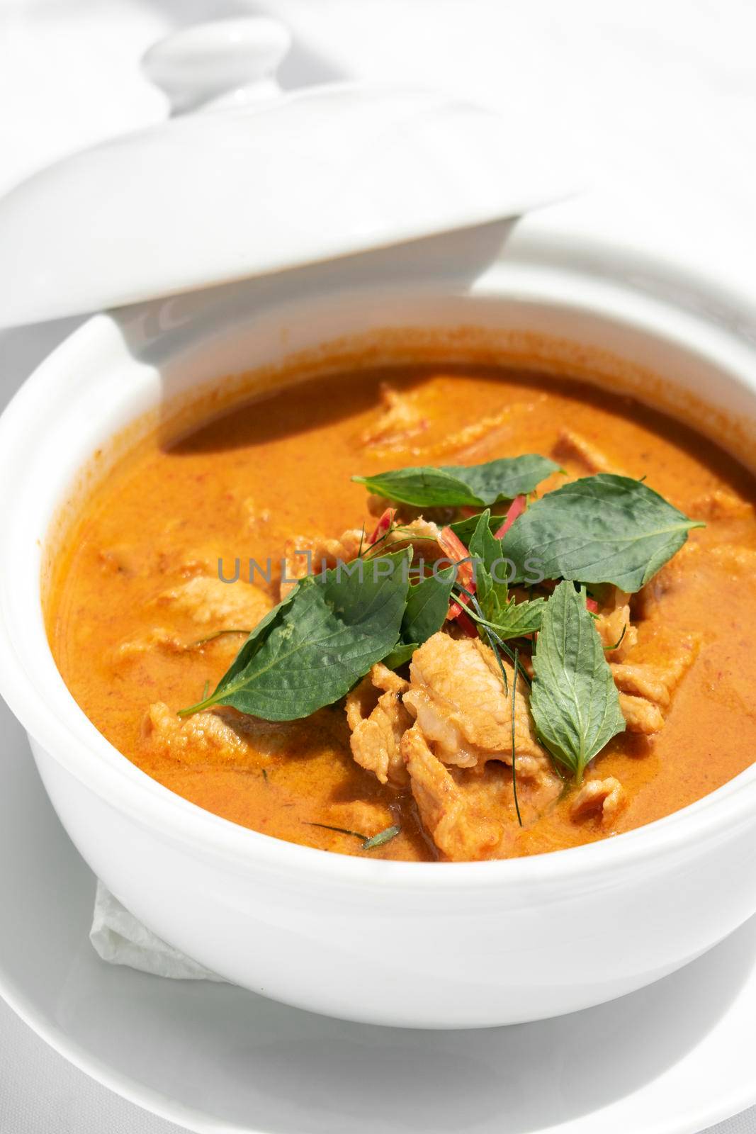 thai spicy panang pork curry with coconut milk by jackmalipan