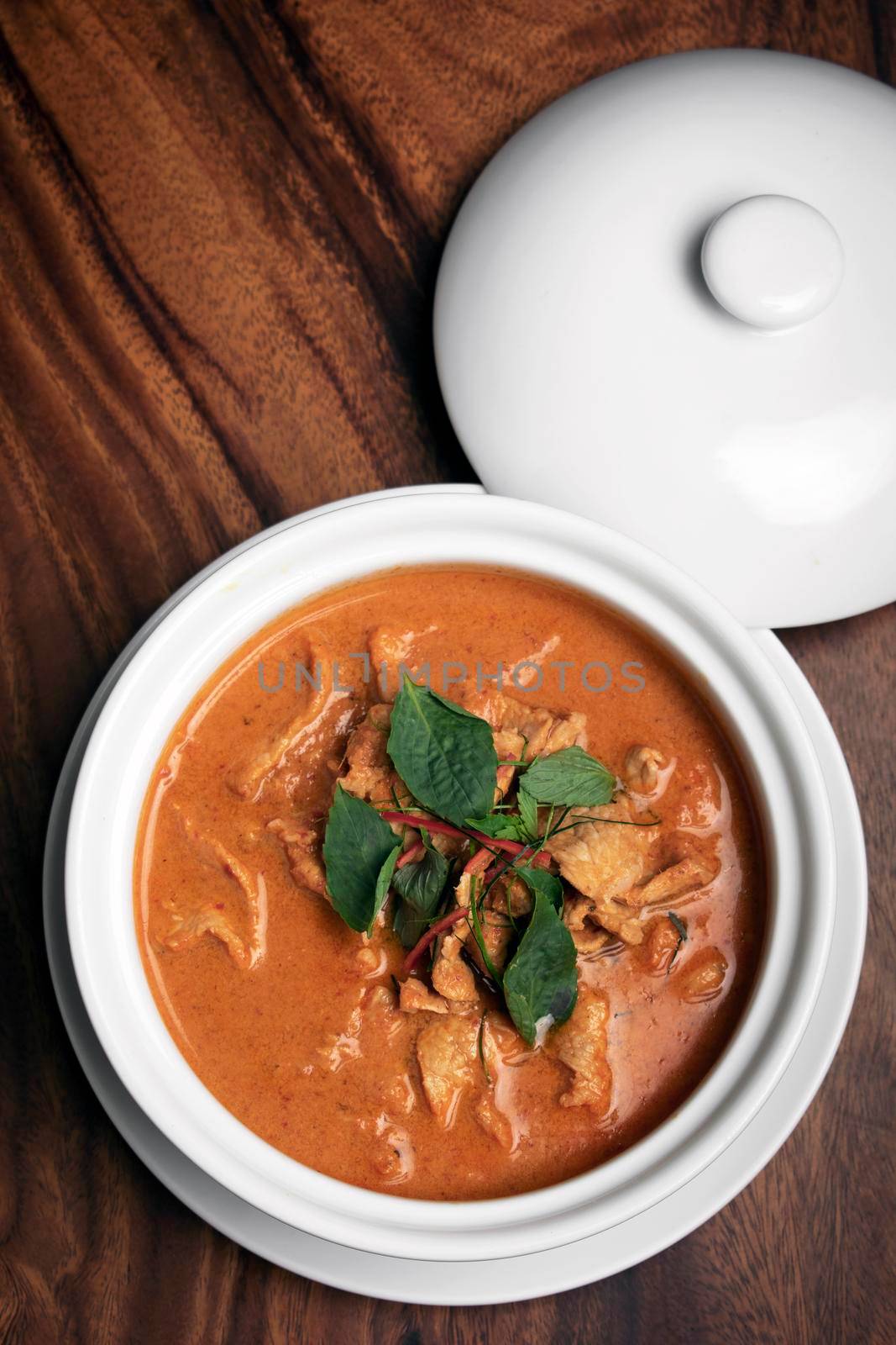 thai spicy panang pork curry with coconut milk by jackmalipan