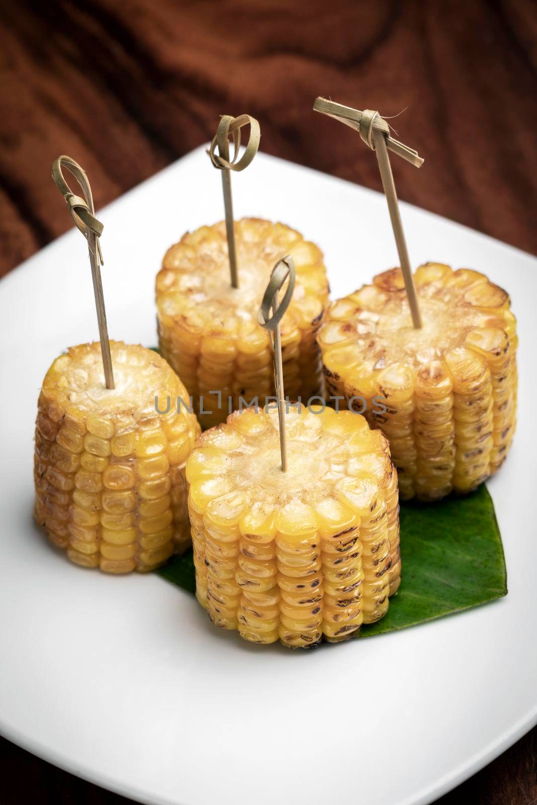 sweet corn on the cob vegetarian tapas snack food by jackmalipan