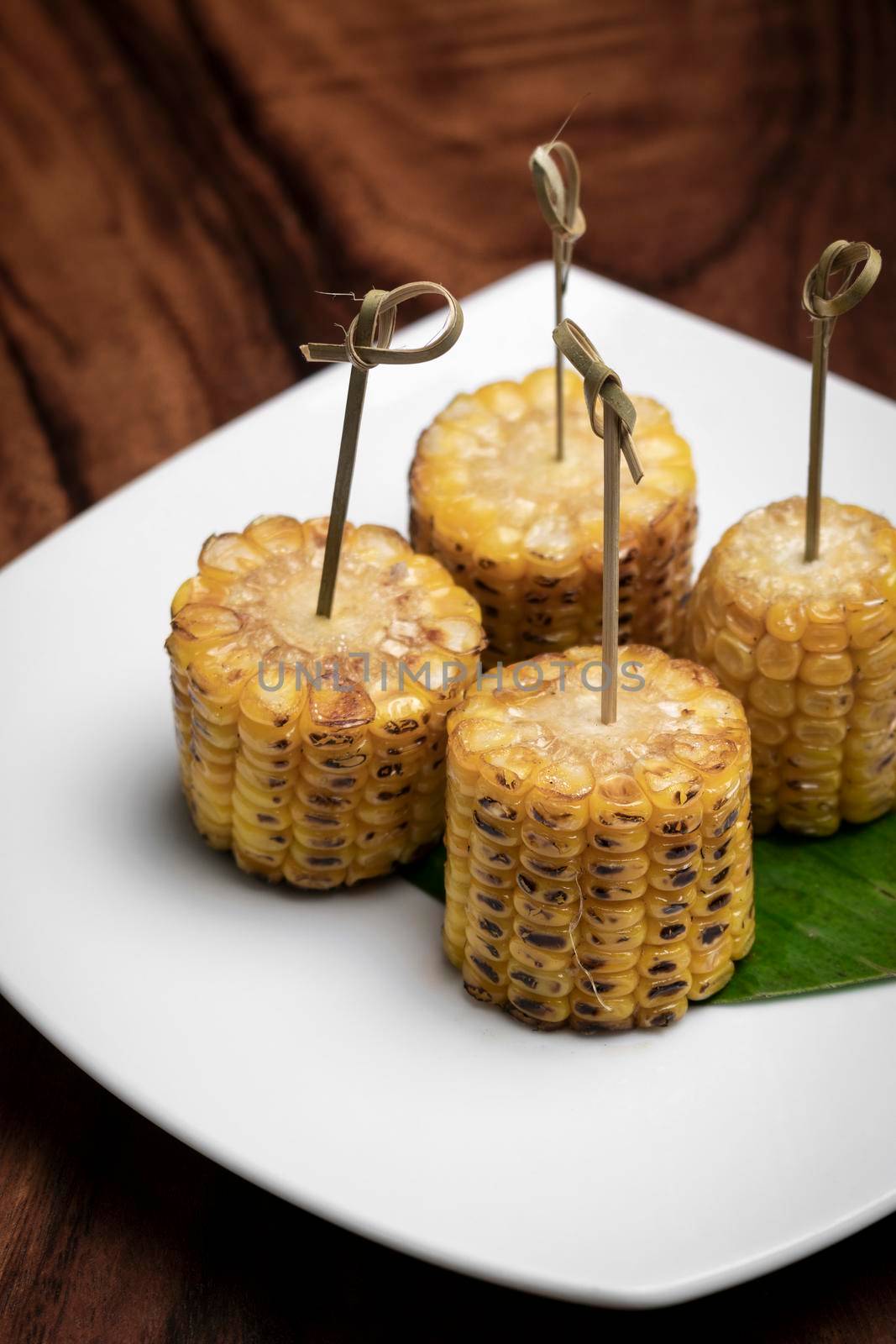 sweet corn on the cob vegetarian tapas snack food by jackmalipan