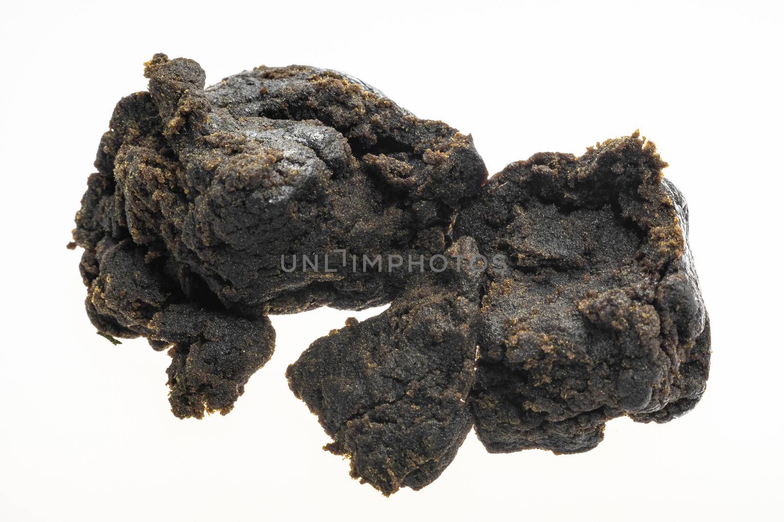 medical marijuana nepalese charas cannabis resin hashish closeup on white background in Nepal