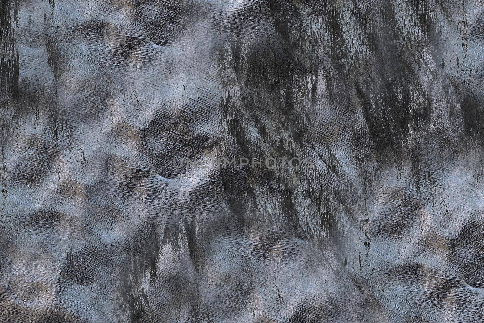 Textured uneven surface of the wall made of dark gray stone