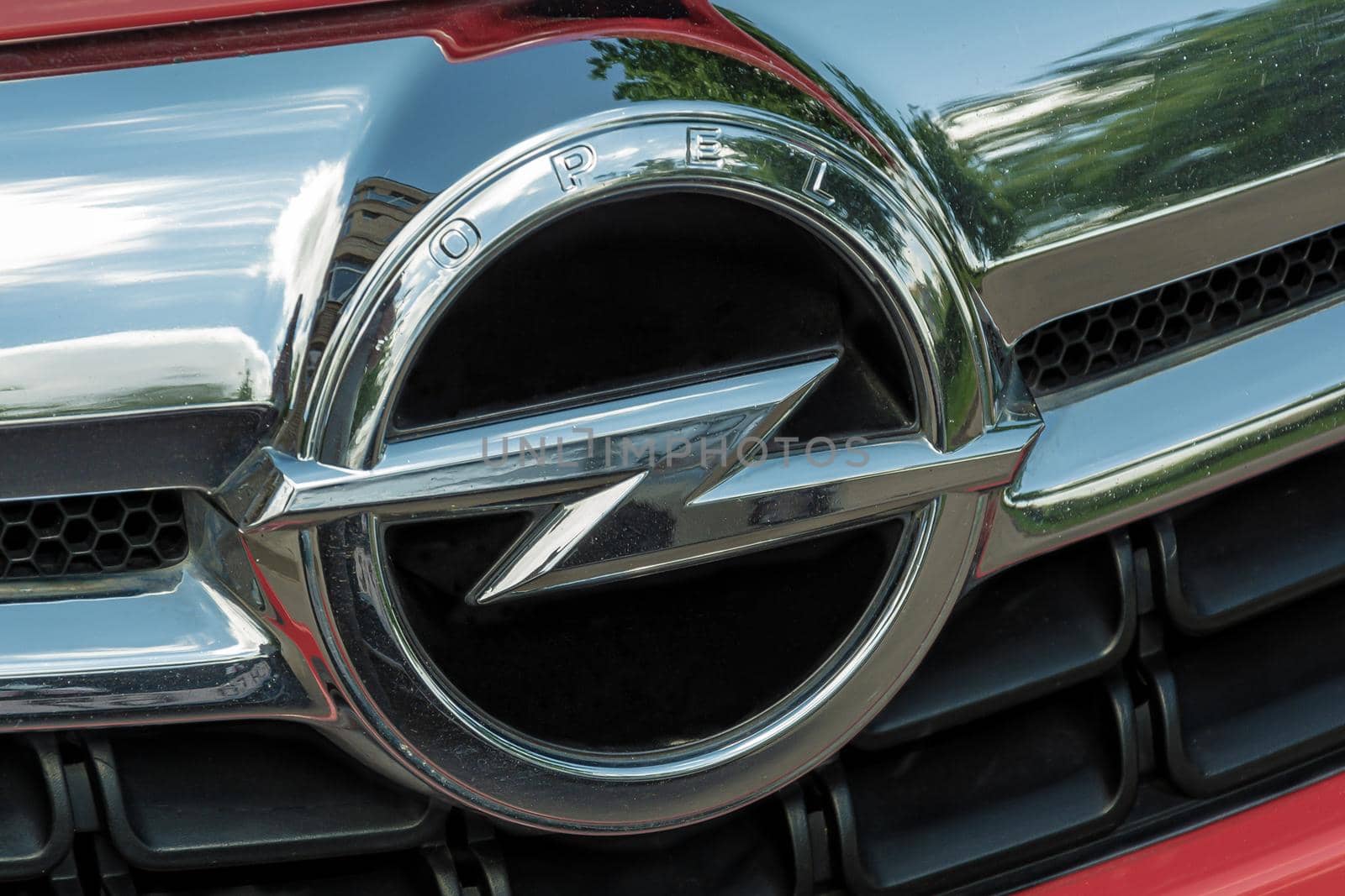 SPAIN, Tenerife - May 28, 2021: OPEL logo on the radiator grille. Stock photo.