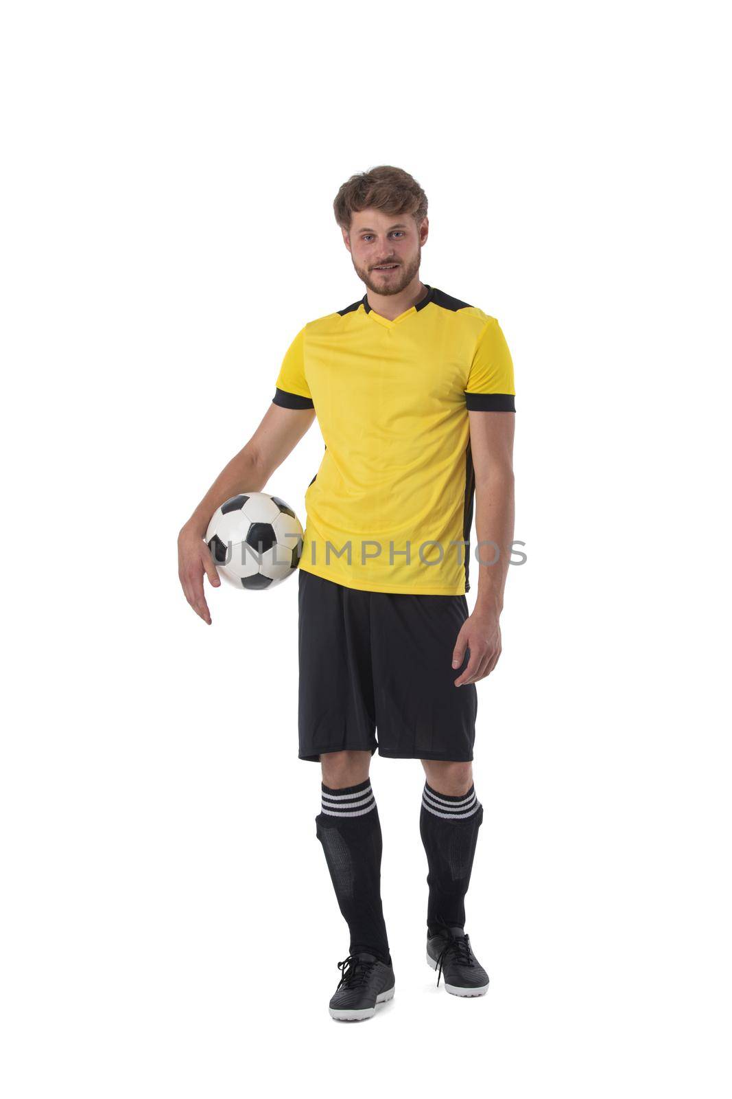 Soccer player is holding ball isolated on white background