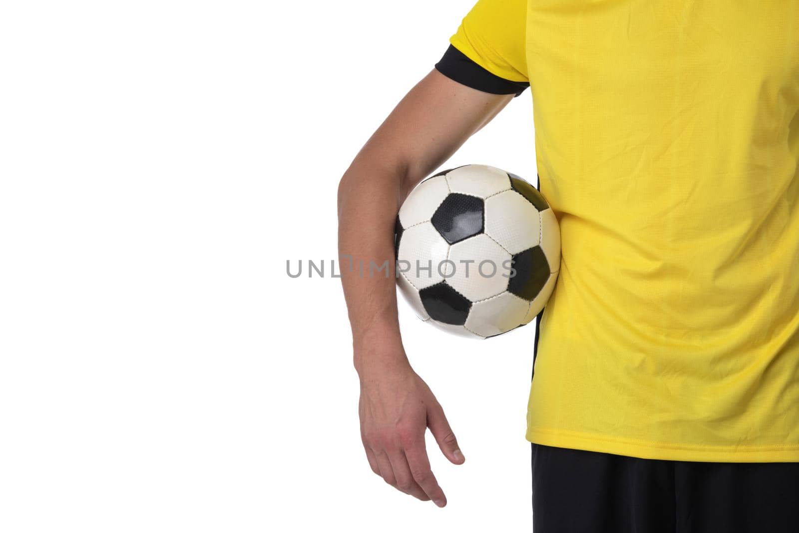 Midsection of a soccer player holding a ball isolated on white background