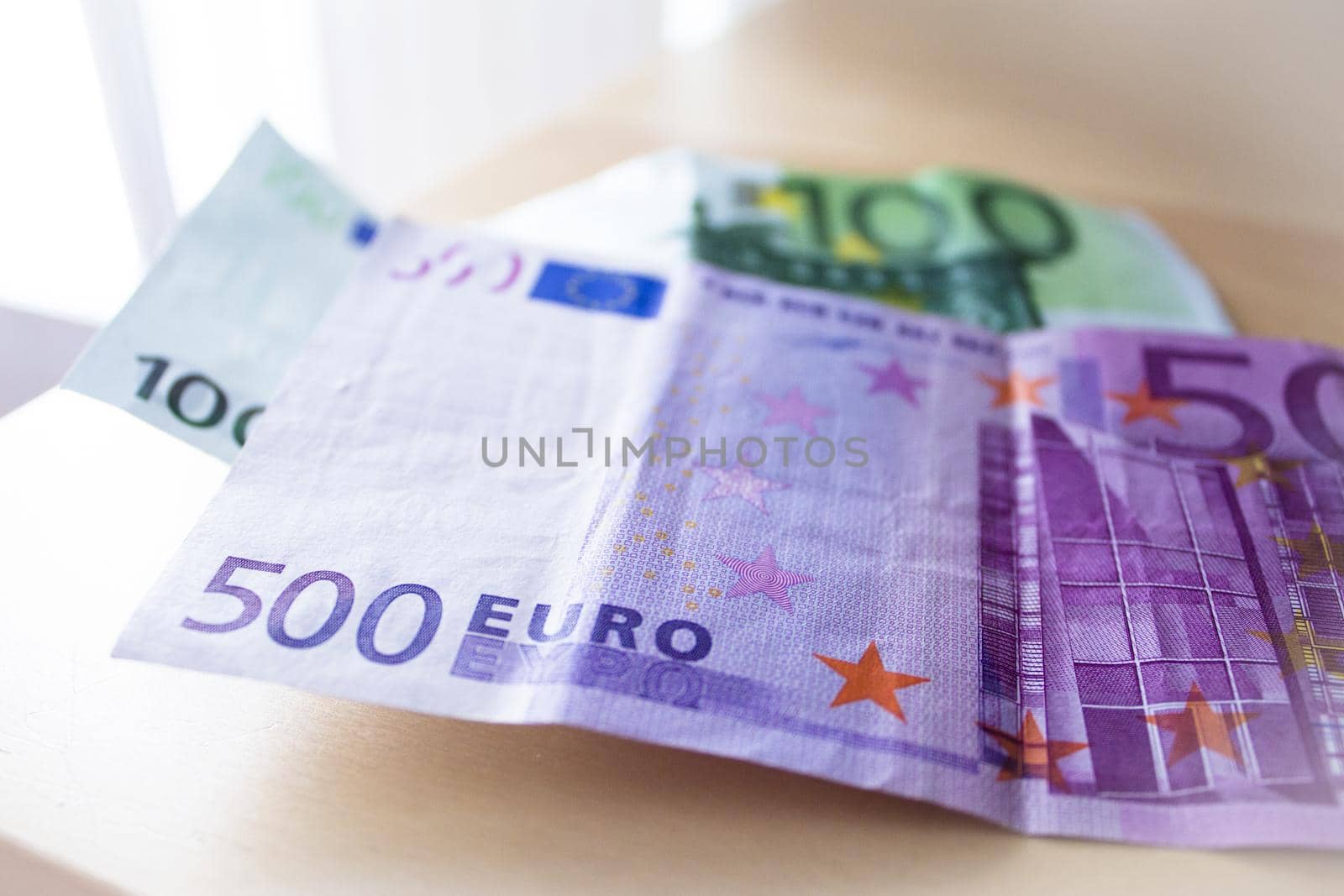 500 and 100 euros in official banknotes. No people