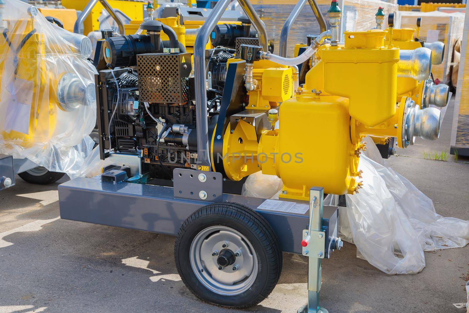 Mobile diesel compressor on wheels for supplying pneumatic air to devices.