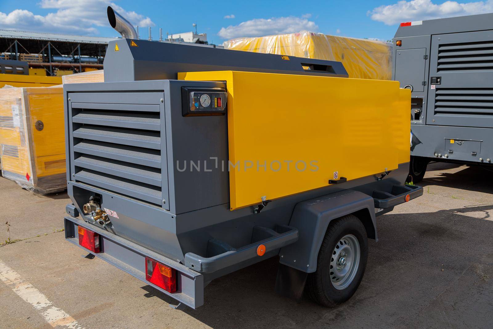 Mobile diesel compressor on wheels for supplying pneumatic air to devices.
