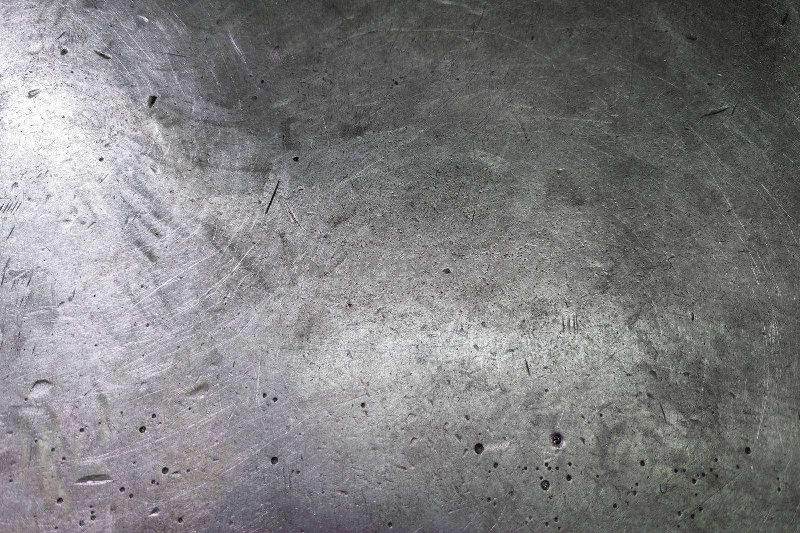 abstract thick steel plate workbench or anvil close-up full frame background with selective focus