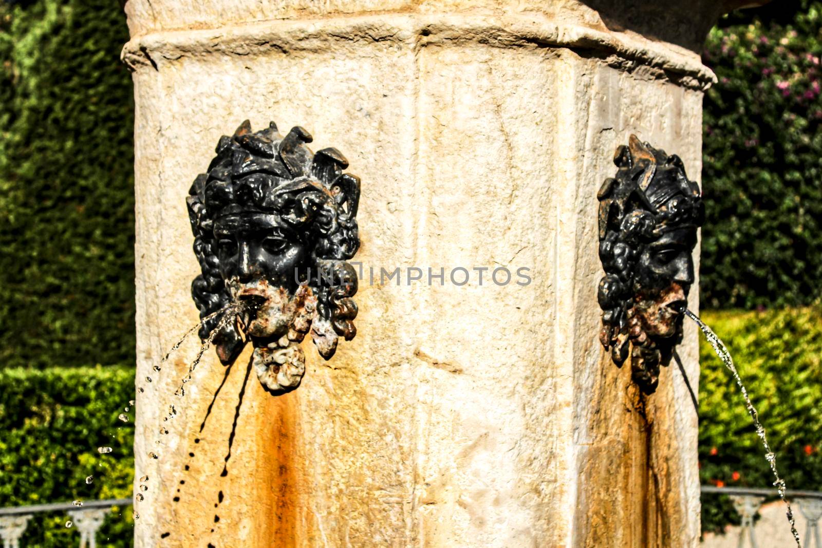 Rusty and vintage fountain in the garden