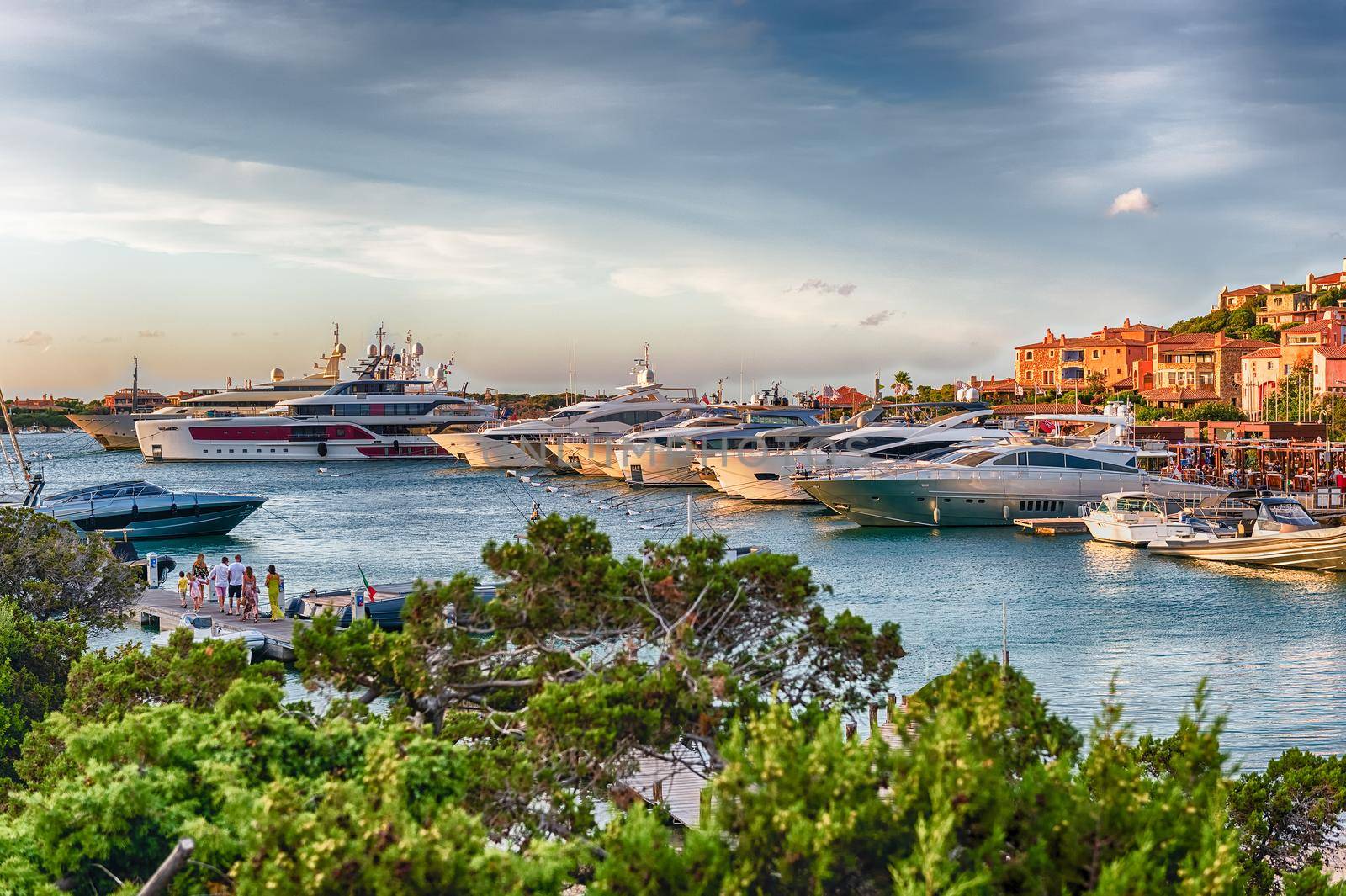 View of the harbor with luxury yachts of Porto Cervo, Sardinia, Italy. The town is a worldwide famous resort and a luxury yacht magnet and billionaires' playground
