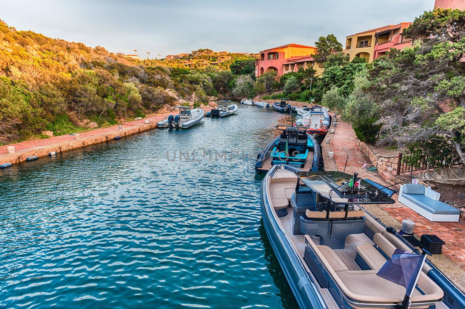 View of the harbor of Porto Cervo, Sardinia, Italy. The town is a worldwide famous resort and a luxury yacht magnet and billionaires' playground