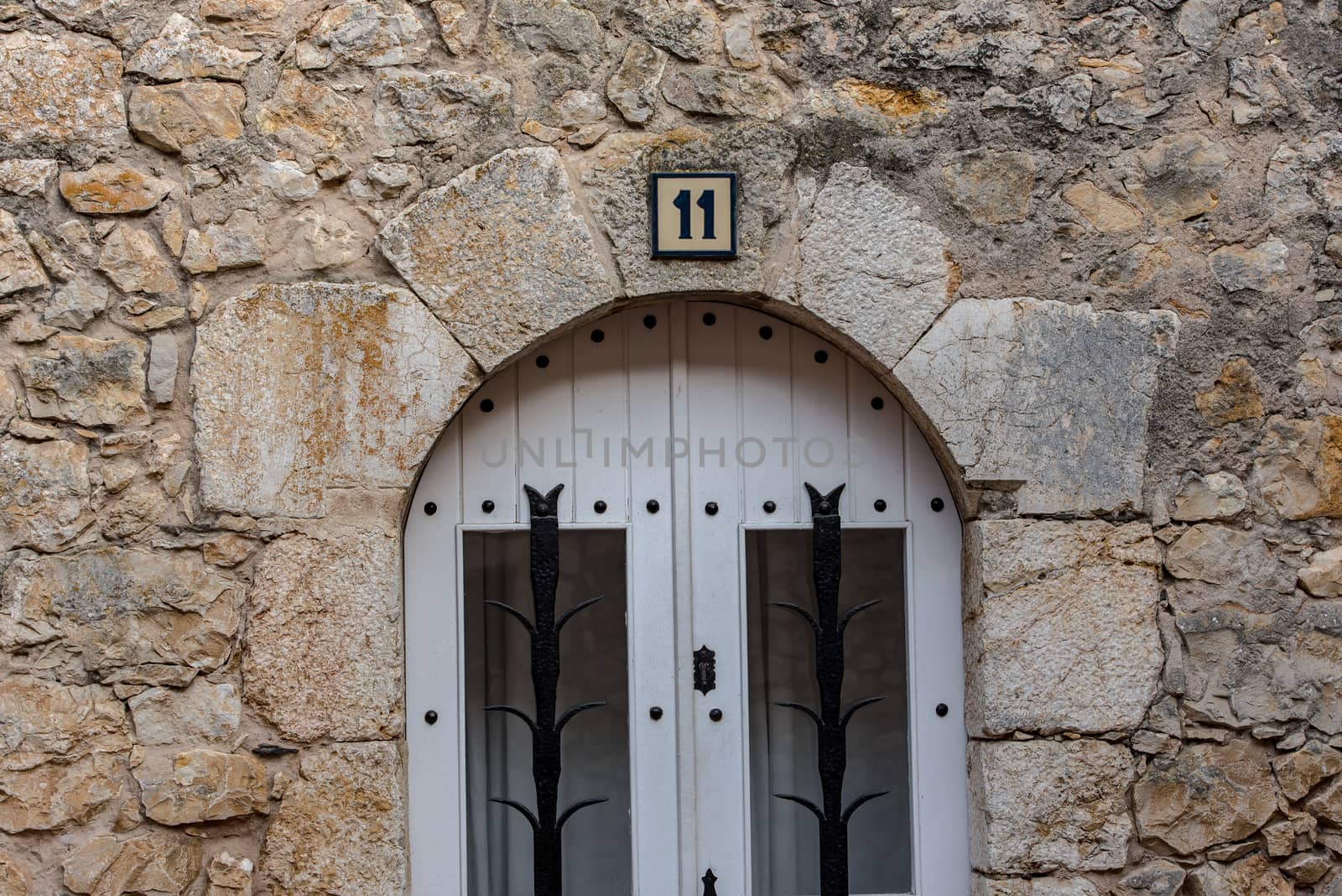 SANT MARTI D'EMPÚRIES, GIRONA, SPAIN: 2020 FEBRUARY 8: SUNNY DAY IN THE OLD CITY OF SANT MARTI DE AMPURIES, GIRONA, SPAIN