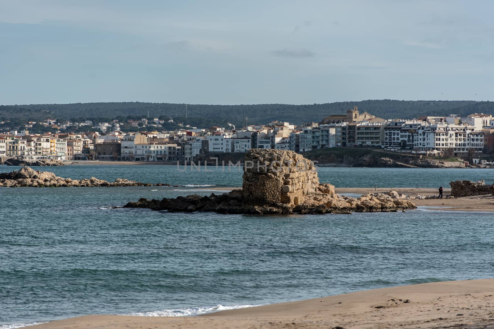 Grec Wall in Platja de Les Muscleres in La Escala behind the ruins of Empuries, in the Province of Giron, Catalonia, Spain.