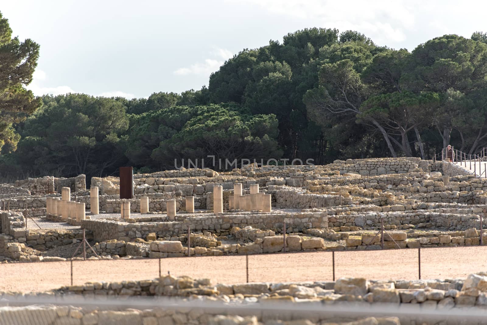 Ruins of Ampuries, La Escala behind the ruins of Empuries, in the Province of Giron, Catalonia, Spain.