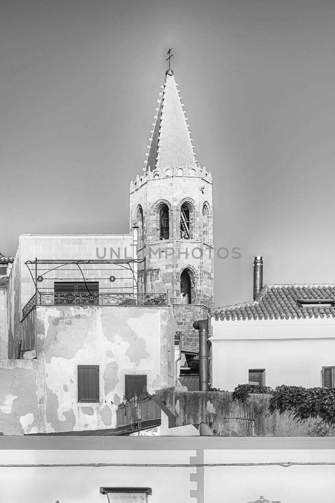 Bell tower of the Cathedral of St. Mary the Immaculate, main Roman Catholic Church located in the historic center of Alghero, Sardinia, Italy