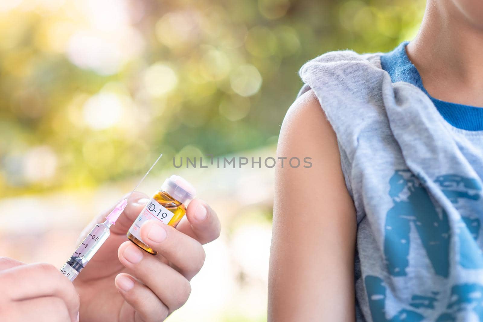 Close-up hand's doctor or nurses are vaccination to patient using the syringe injected upper arm for treated,Doctor giving an injection to a patient