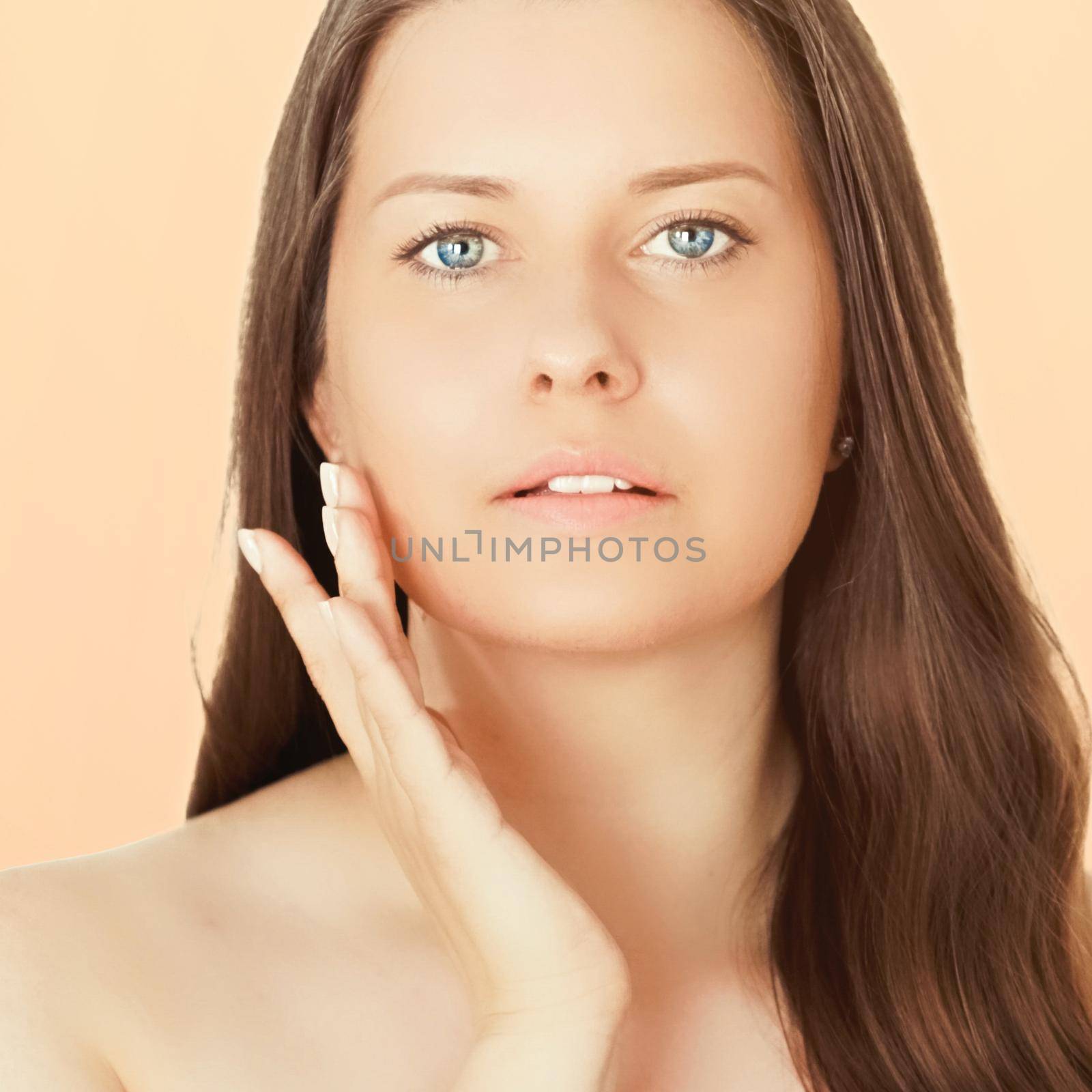 Sunny face portrait of young woman, suntan skin tone and beauty cosmetics. Beautiful brunette female model with natural tan using sunscreen product by Anneleven