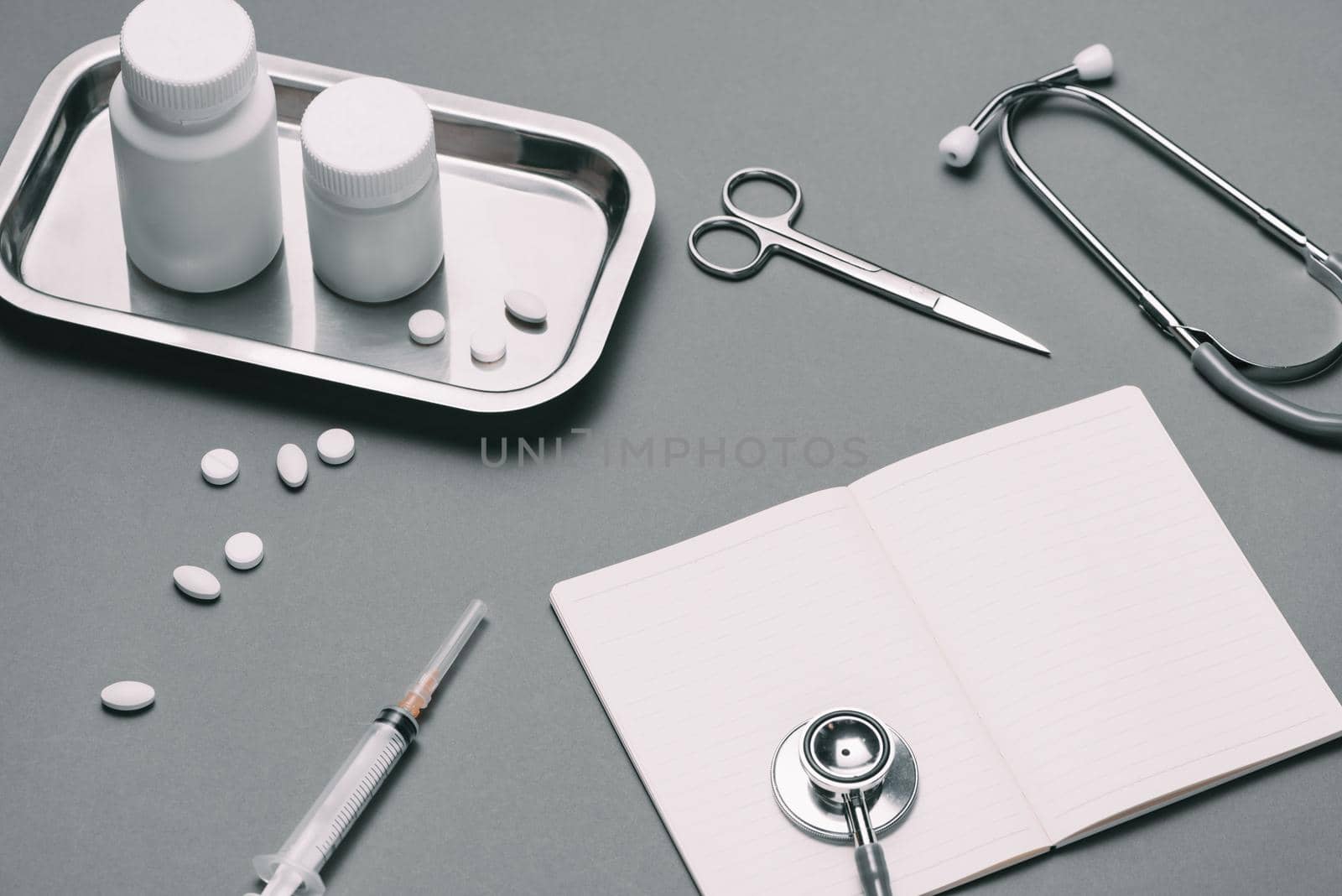 Doctor desk table with stethoscope and medical items. Flat lay. by makidotvn