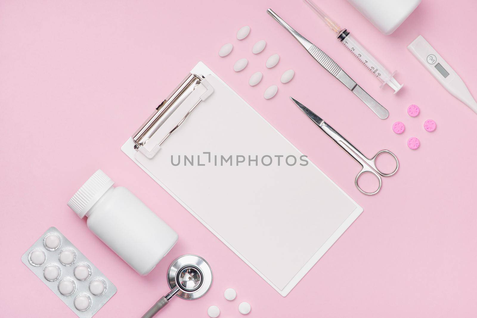 Medical equipment.  Medical concept on pink rose background