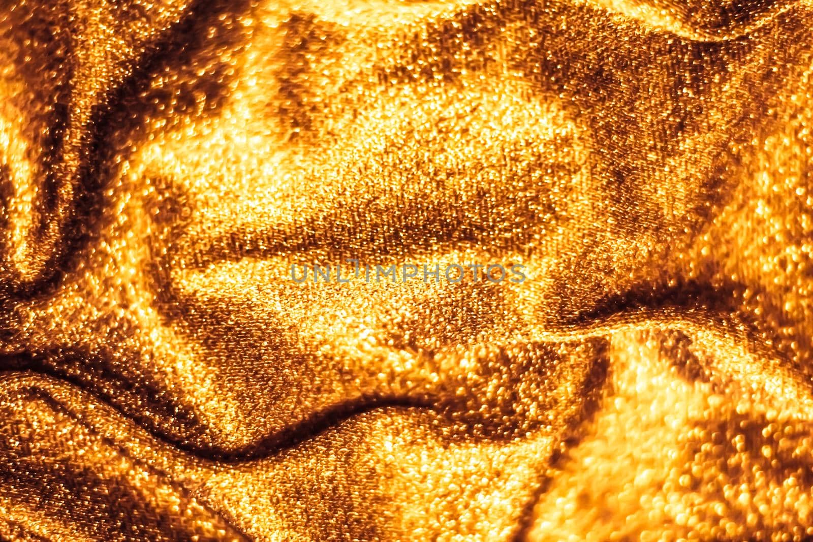 Luxe glowing texture, night club branding and New Years party concept - Golden holiday sparkling glitter abstract background, luxury shiny fabric material for glamour design and festive invitation