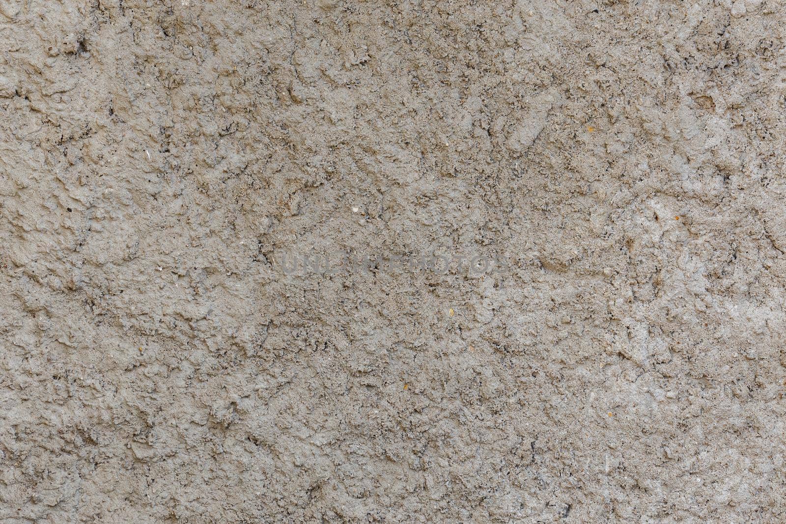 rough and bumpy cement industrial wall - flat texture and background.