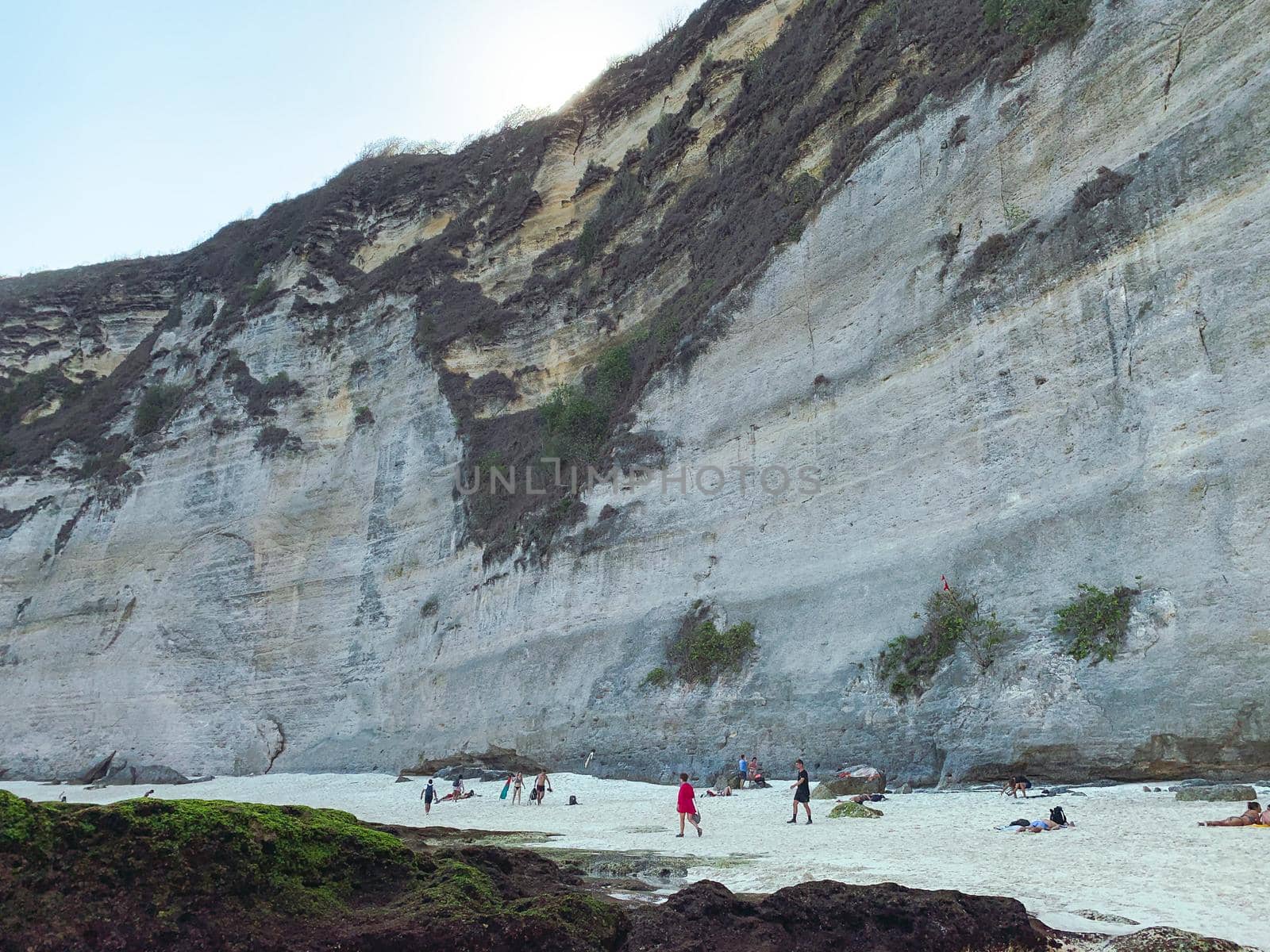 Diamond Beach With White Sandy Beaches, Palm Trees, White Carved Sandstone Steps, White Cliffs and Bright Turquoise Water Backed By A Bali Swing On Nusa Penida, Bali, Indonesia. by Benzoix