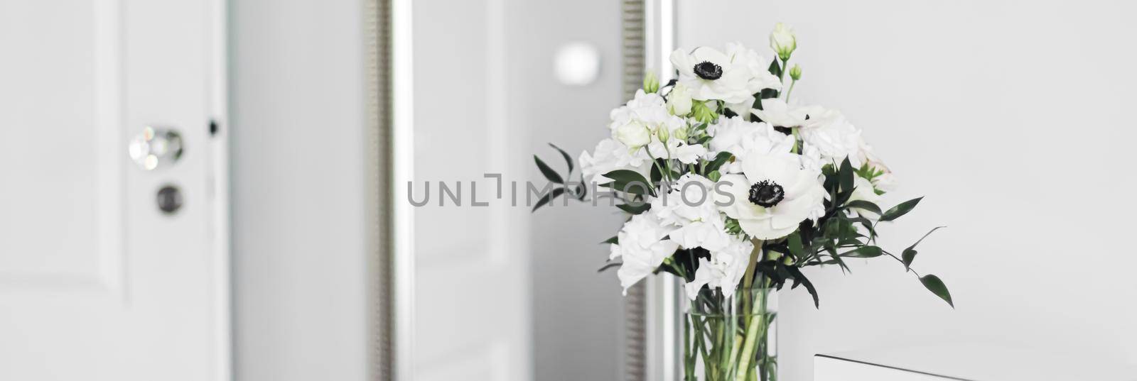 Bouquet of flowers in vase and home decor details, luxury interior design closeup