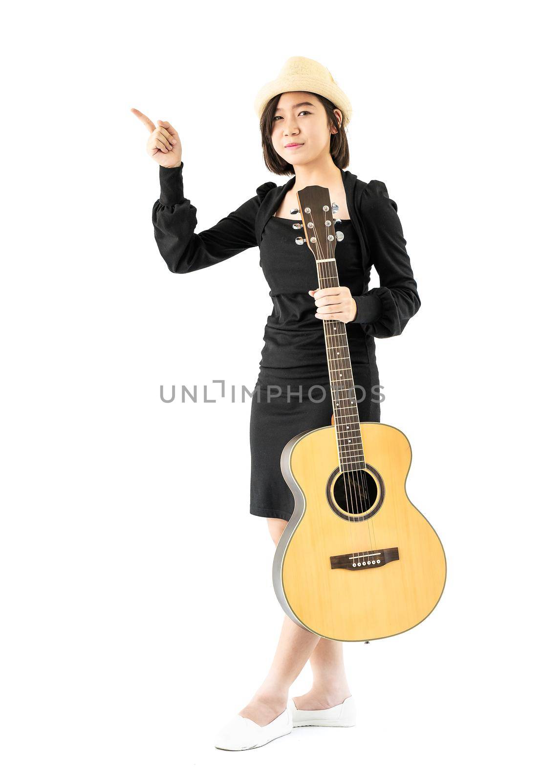 Young asia woman hold guitar guitar folk song in her hand isolate on white background