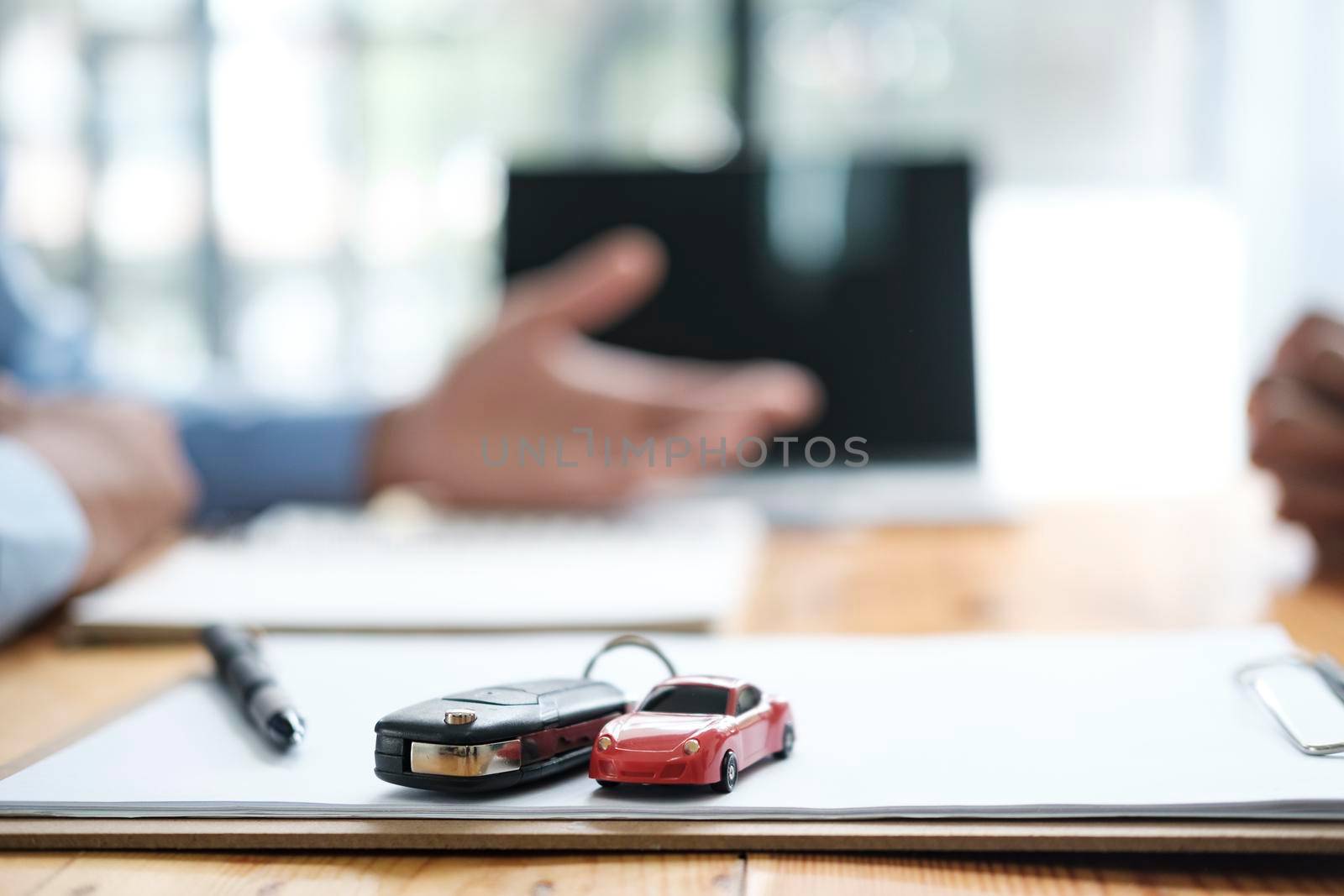 Business concept, car insurance, sell and buy car, car financing, car key for Vehicle Sales Agreement.