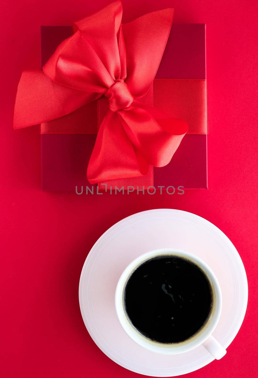 Romantic celebration, lifestyle and birthday present concept - Luxury beauty gift box and coffee on red, flatlay