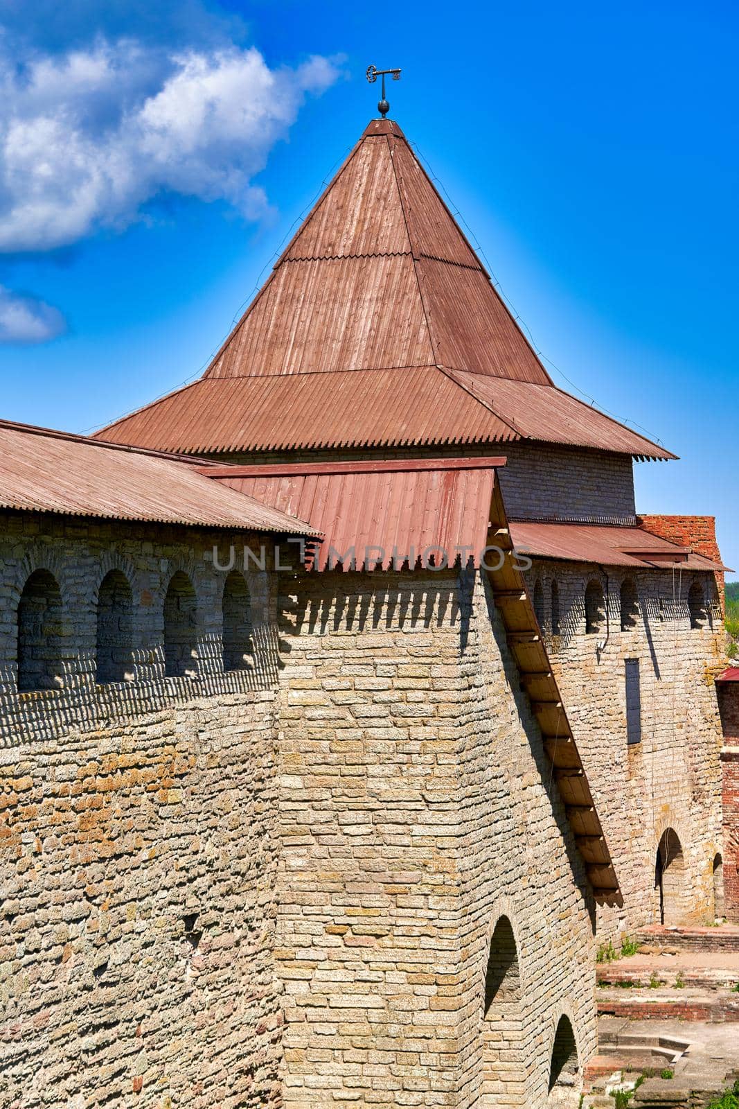 View of the old stone fortress with a watchtower. Fortress Oreshek on a sunny summer day