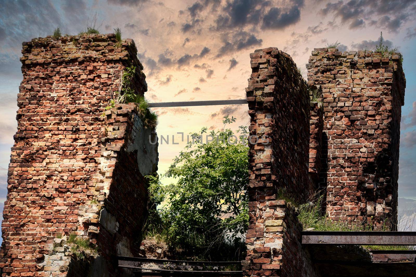 A destroyed brick building on the territory of the Oreshek fortress, red brick ruins