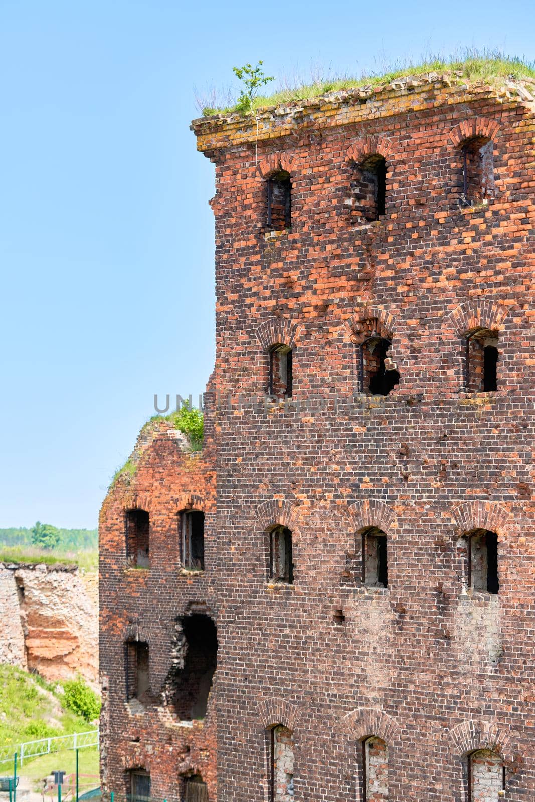 A destroyed brick building on the territory of the Oreshek fortress, red brick ruins