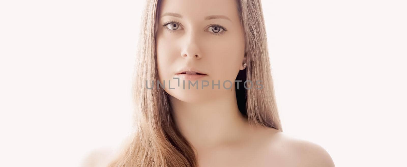 Beautiful woman with natural look, perfect skin and shiny hair as make-up, health and wellness concept. Face portrait of young female model for skincare cosmetics and luxury beauty ad design.