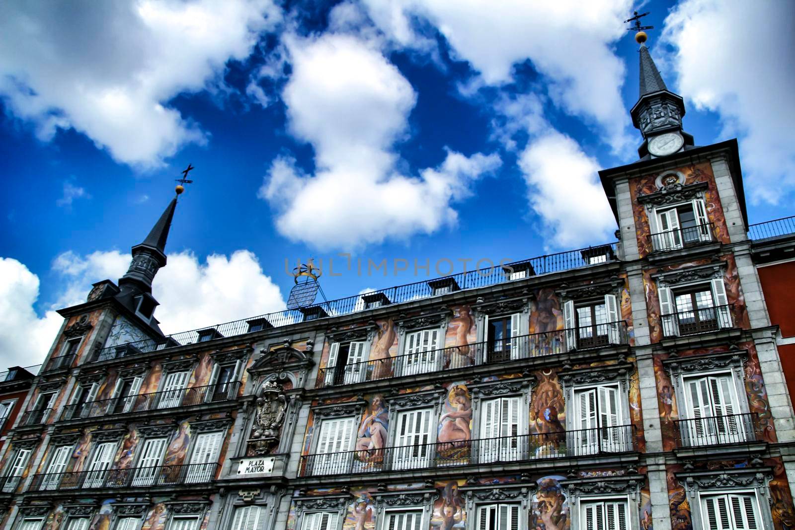 Beautiful main square in Madrid called Plaza Mayor with its majestic facades in a sunny day of Spring