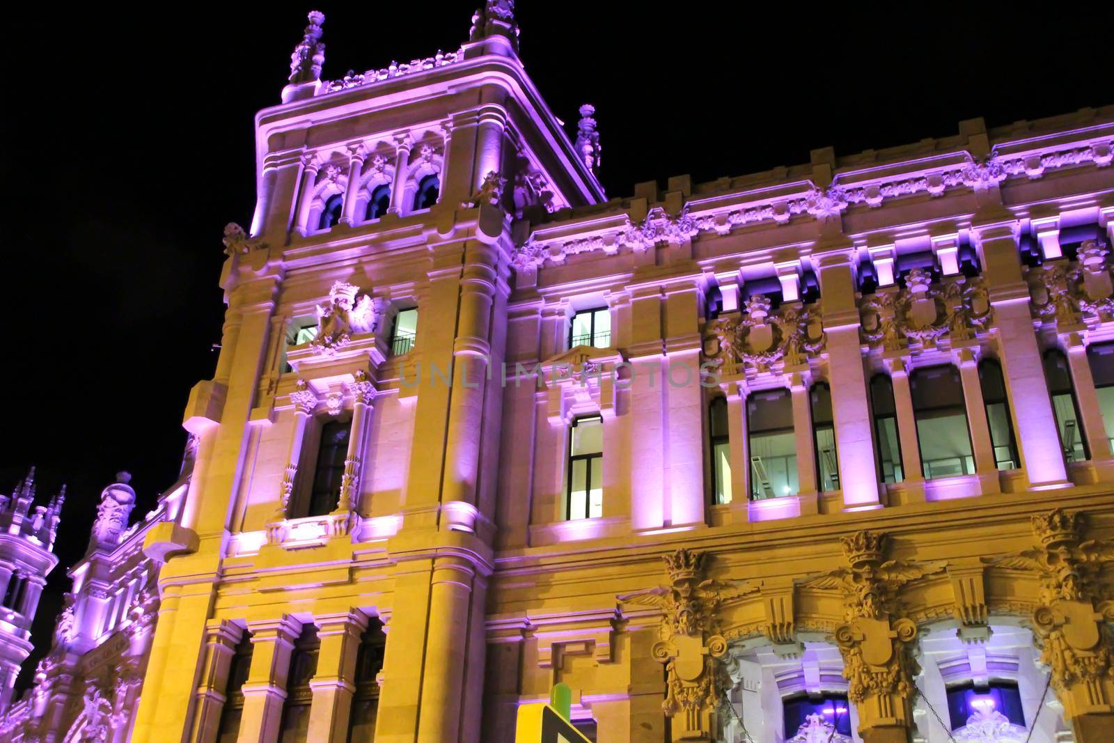 City Hall building illuminated in purple for Women's Day by soniabonet