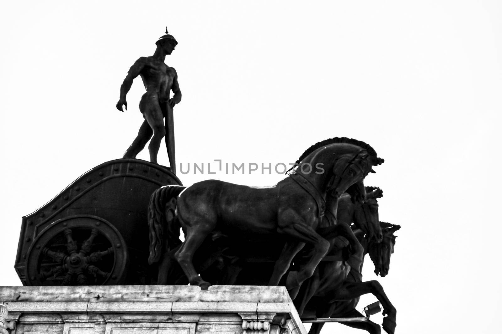 Quadriga statue on the roof of a building in Madrid by soniabonet