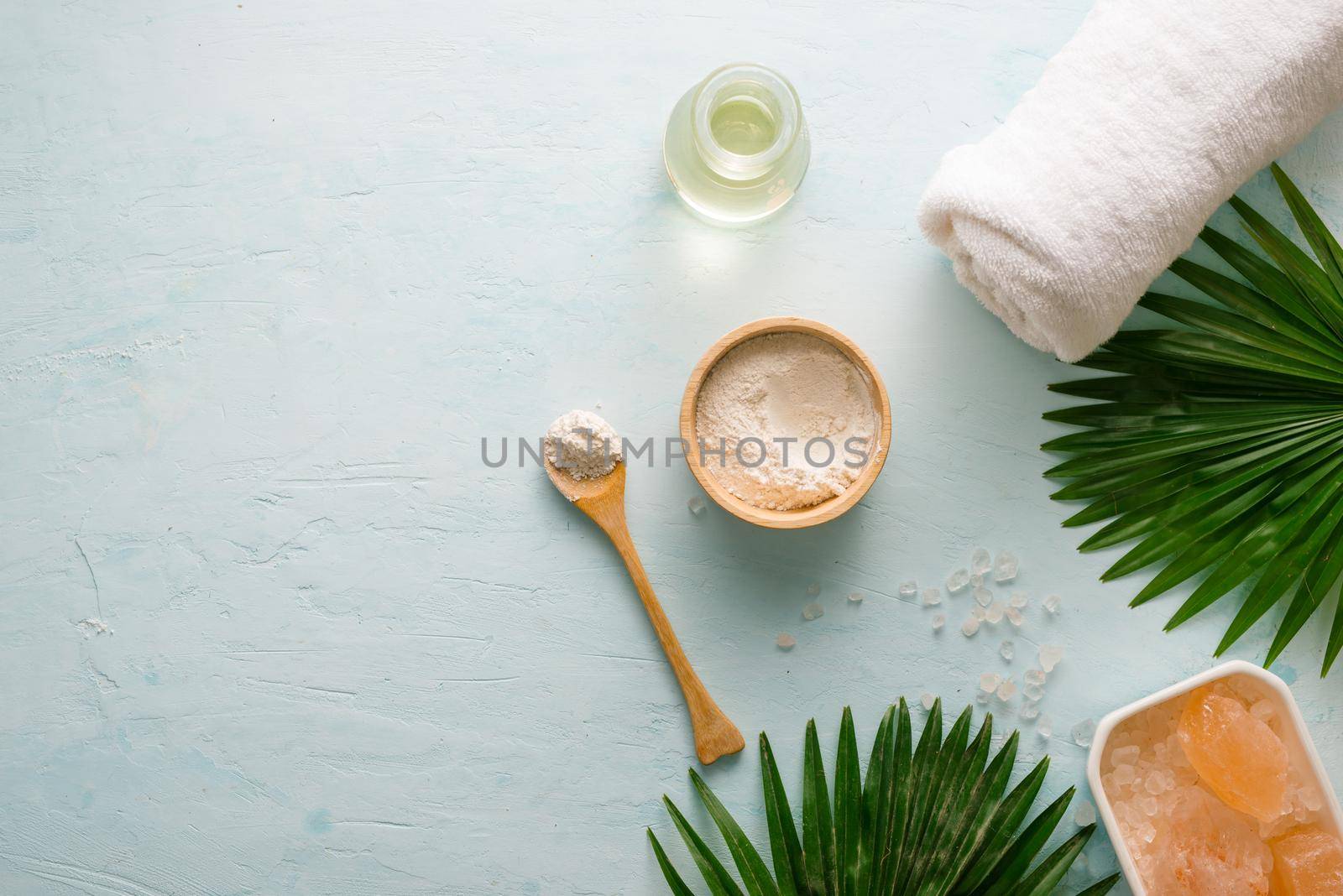 Beauty oncept with spa set on blue wooden background