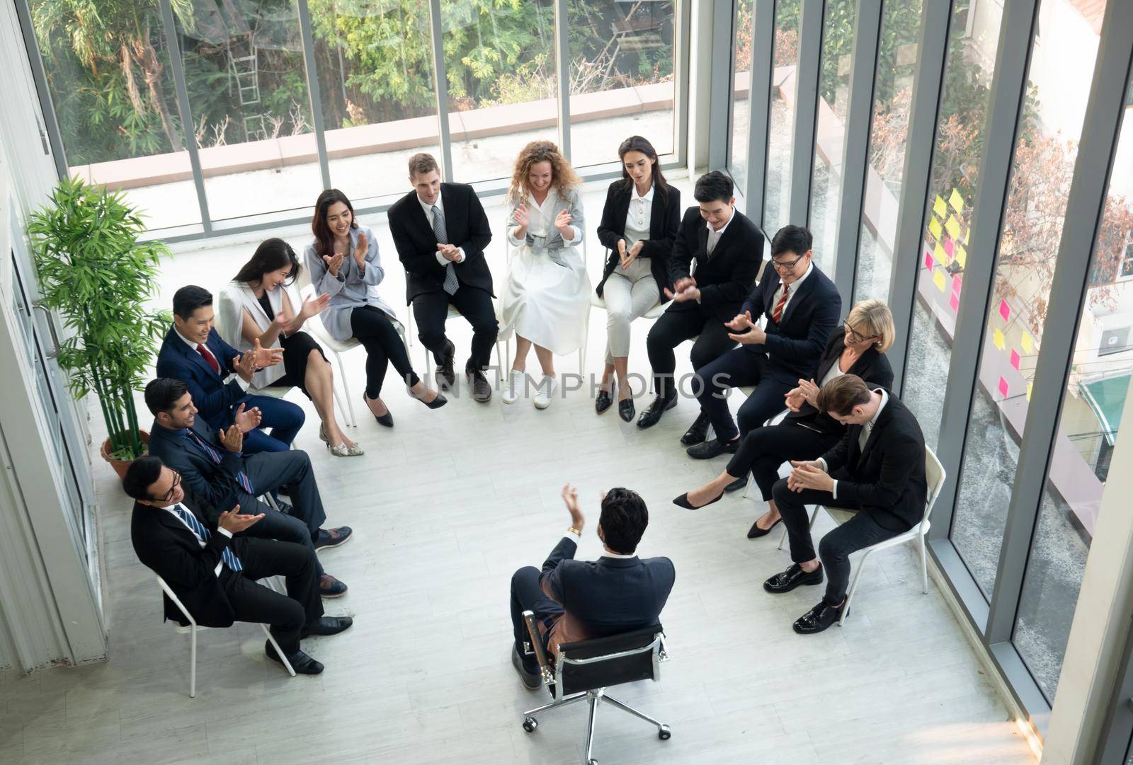 Shot of a group of businesspeople having a discussion in an office 