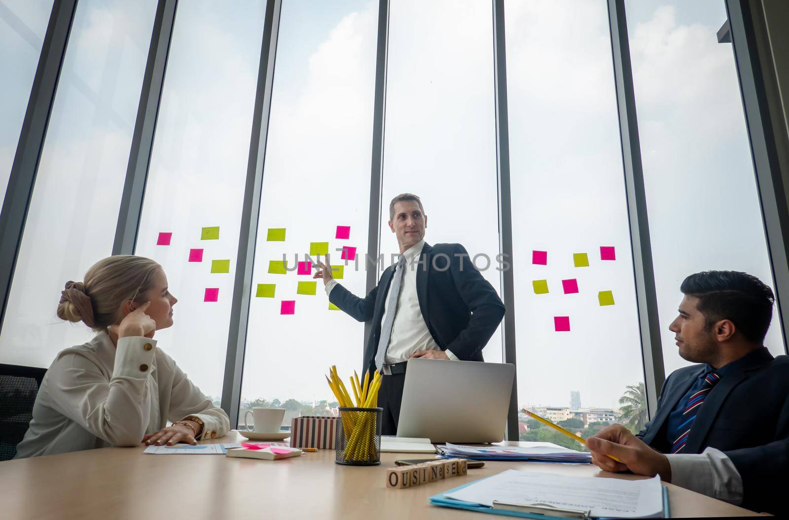 Shot of a group of businesspeople having a discussion in an office 