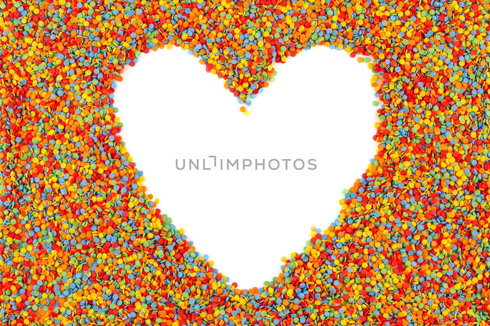 Rainbow colored sugar sprinkle dots, decorative heart shape frame mockup.
