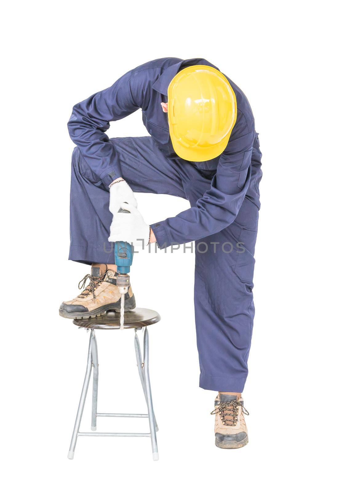 Young handyman in unifrom standing with his electric drill, Cutout isolated on white background