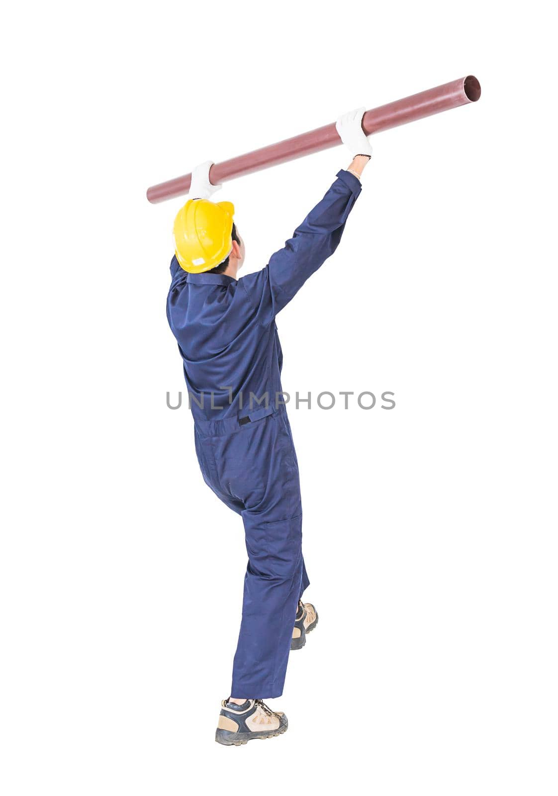 Young plumber in uniform holding pvc pipe isolated on white background