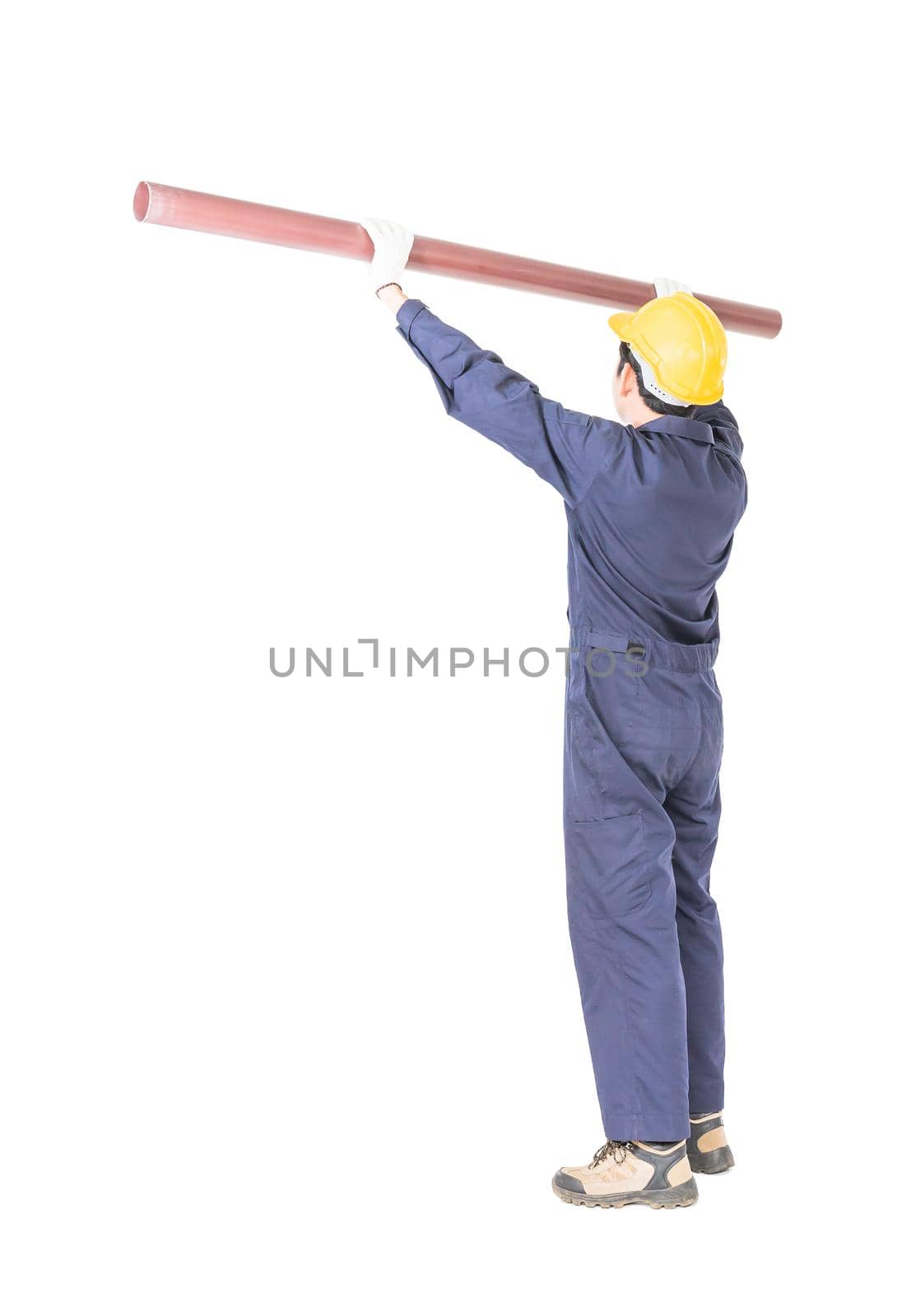 Plumber in uniform holding pvc pipe with clipping path by stoonn